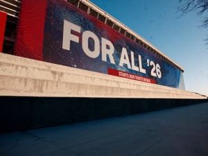 Custom mesh banner at sports stadium — large format outdoor signage printing
